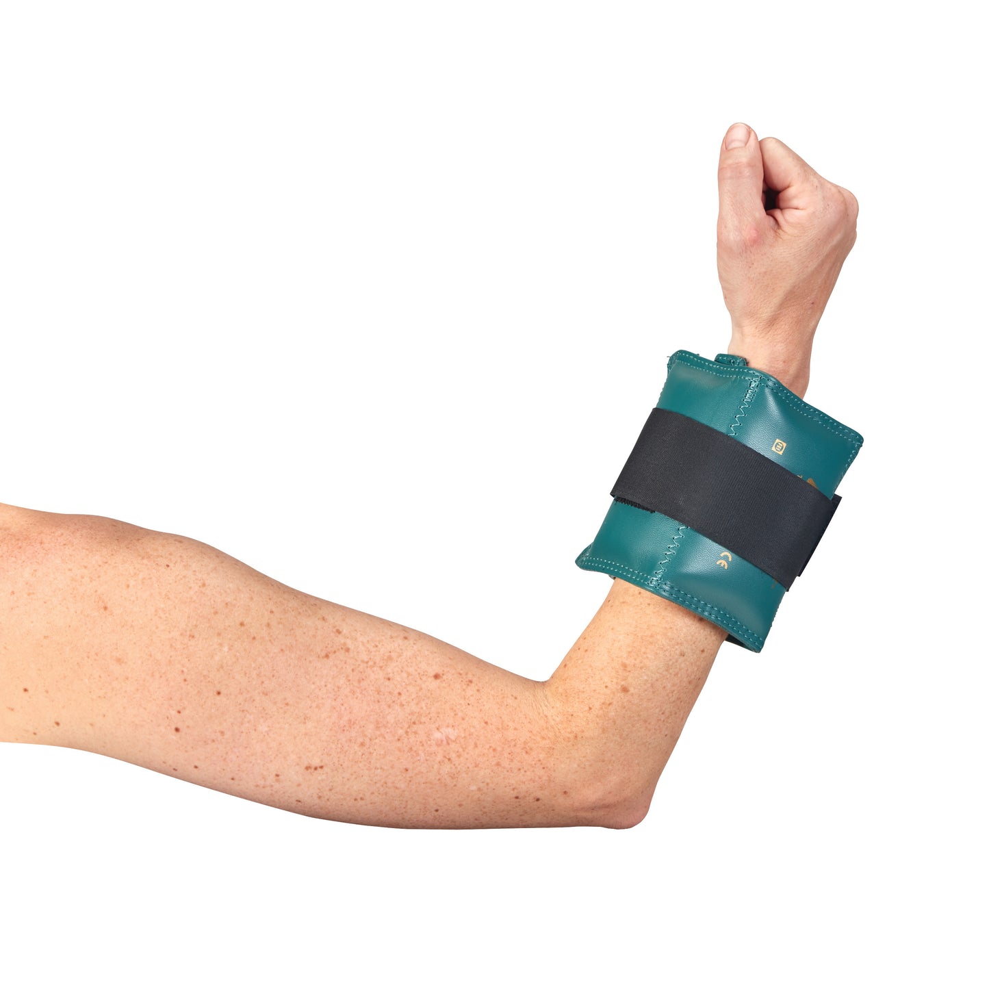 A person's arm is flexed, wearing an AliMed Color-Coded Cuff Weight in teal, secured with a black strap around the wrist.