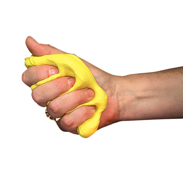 A hand squeezes bright yellow AliMed Color-Coded Therapy Putty against a white background.