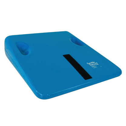 A blue Tumble Forms2 Wedge designed for physical therapy, featuring two side indentations and a black strip on the top surface.