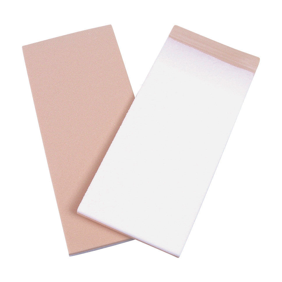 Two rectangular foam sheets from the AliMed Plastazote Laminate Pack, one beige and one white, are slightly overlapped.
