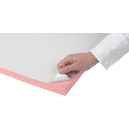 A hand peels a white cover to reveal the adhesive side of a pink AliMed T-Stick Adhesive-Backed Padding.