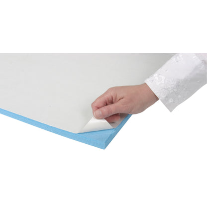 A hand peels the protective layer from AliMed T-Stick Adhesive-Backed Padding. The padding has a blue edge and white top.