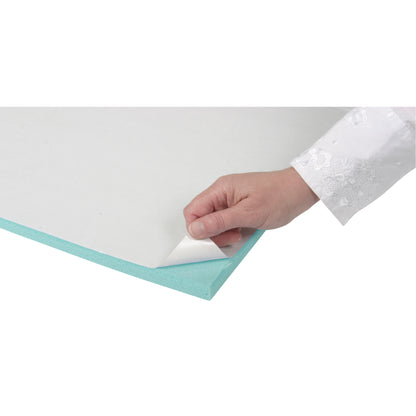 A hand peels off a corner of an AliMed T-Stick Adhesive-Backed Padding, showing its blue foam and sticky underside.