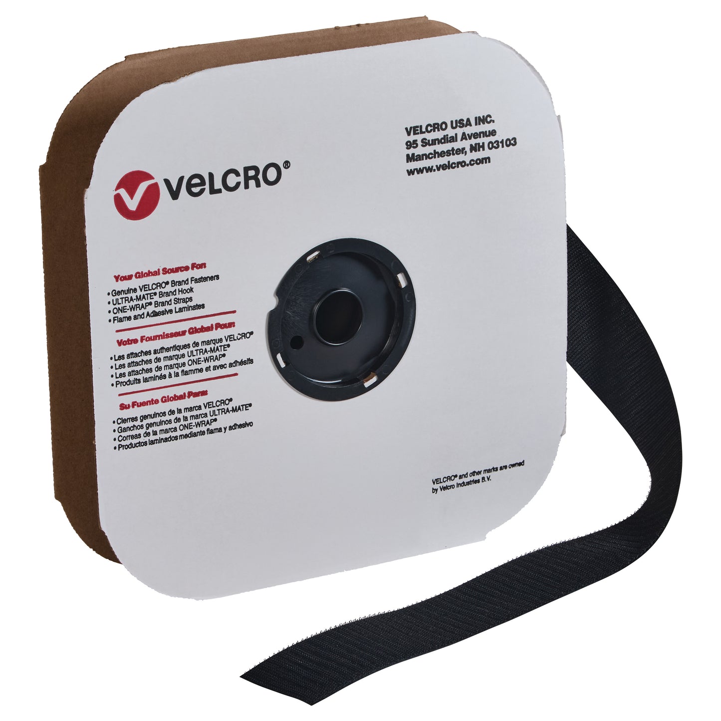Roll of Standard VELCRO Brand Hook Tape partially unrolled from a white and brown dispenser with printed text.