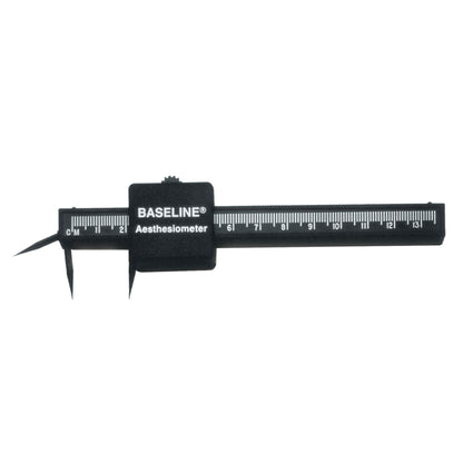 A Baseline Aesthesiometer with a black scale for measuring tactile sensitivity, marked in centimeters from 0 to 13.