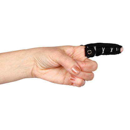 A hand wears a "Finger Hugger Model 670," a black fabric sleeve with white stitching, covering the index finger.