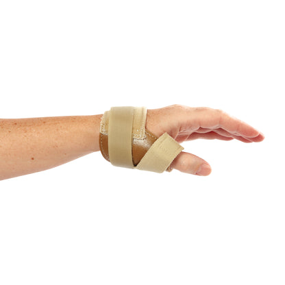 A hand wearing an AliMed FREEDOM Thumb Stabilizer. The beige brace supports the thumb and wrist with adjustable straps.