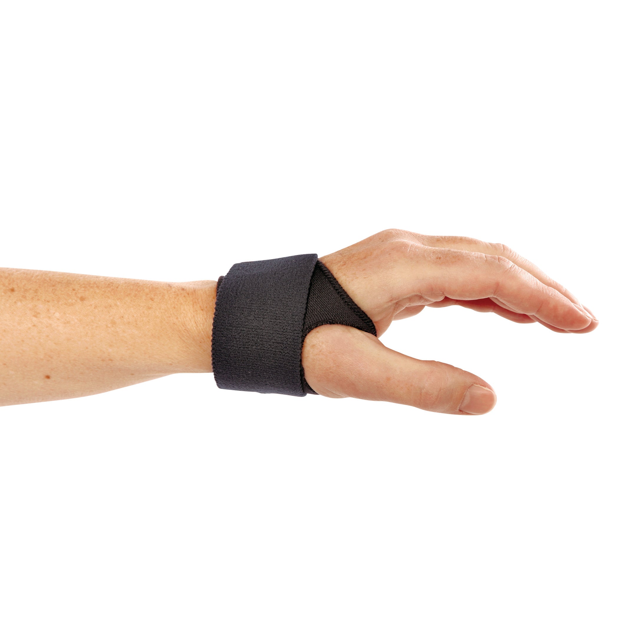 A hand wearing the AliMed FREEDOM AliDry CMC ThumbFit Support, a black wrist and thumb brace for stabilization.