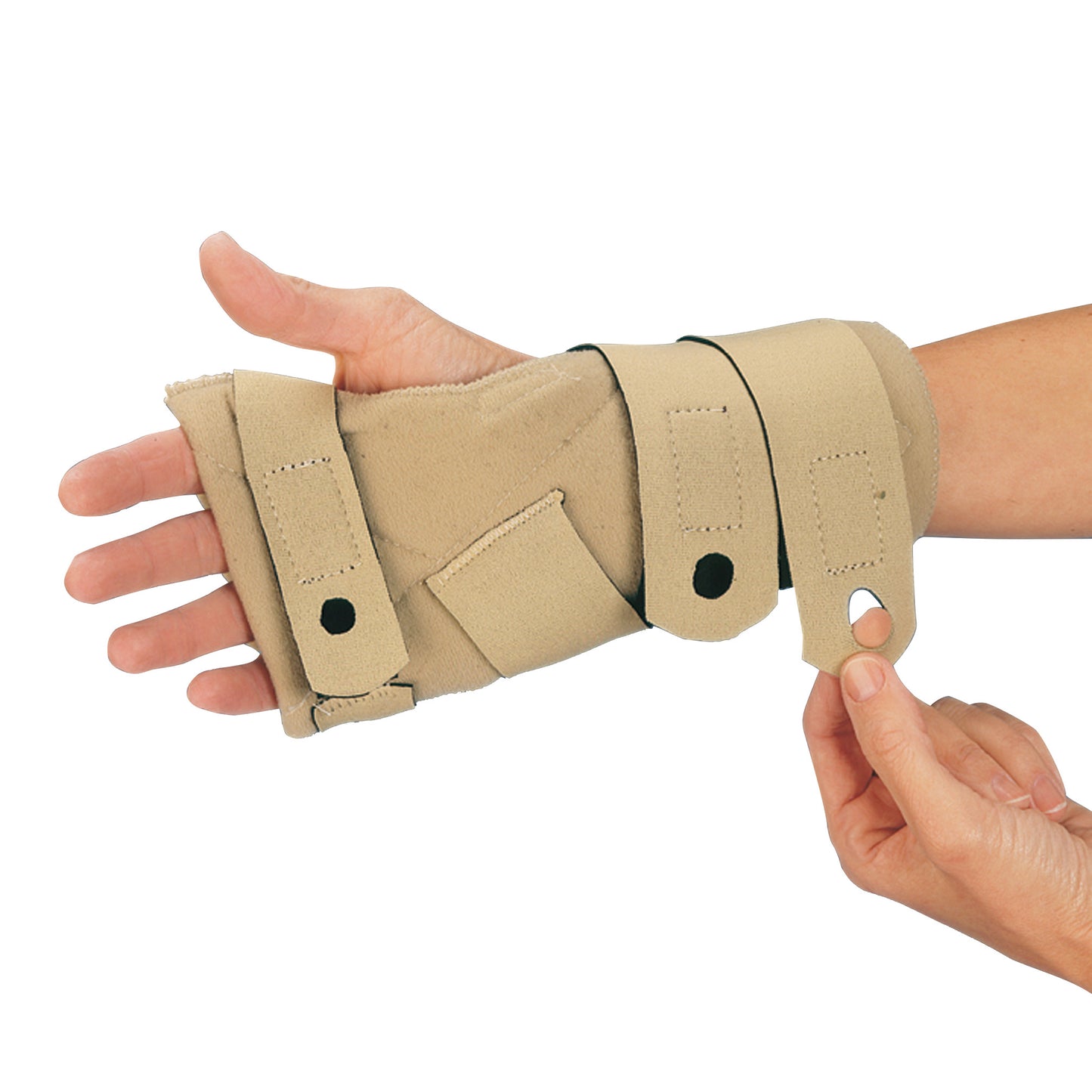 A hand wearing a beige 3pp Comforter Splint, adjusting the strap. The splint supports the wrist and thumb with multiple fasteners.