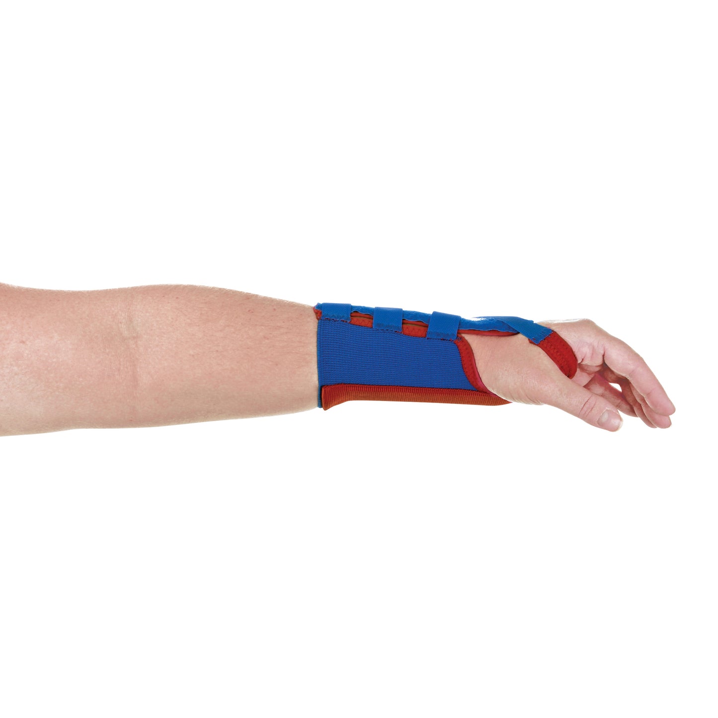 A person's hand and forearm wearing the FREEDOM USA Short Elastic Wrist Support in blue and red for wrist stabilization.