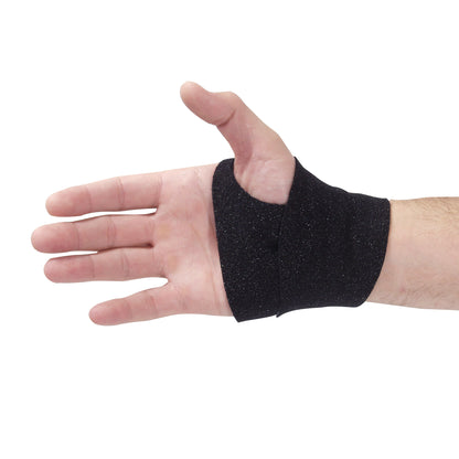 A person's hand wearing an AliMed FREEDOM comfort fabrifoam Wrist Wrap, showcasing its fit and design on the wrist.