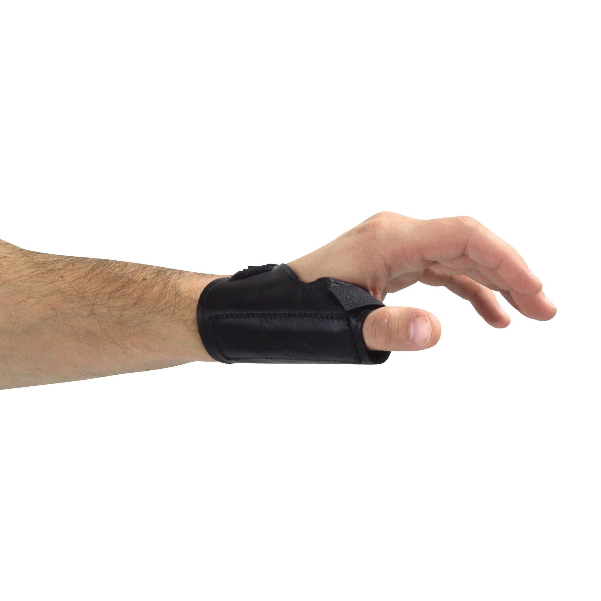 A person's hand wearing the AliMed Low-Profile Thumb Stabilizer in black, providing support to the thumb and wrist.