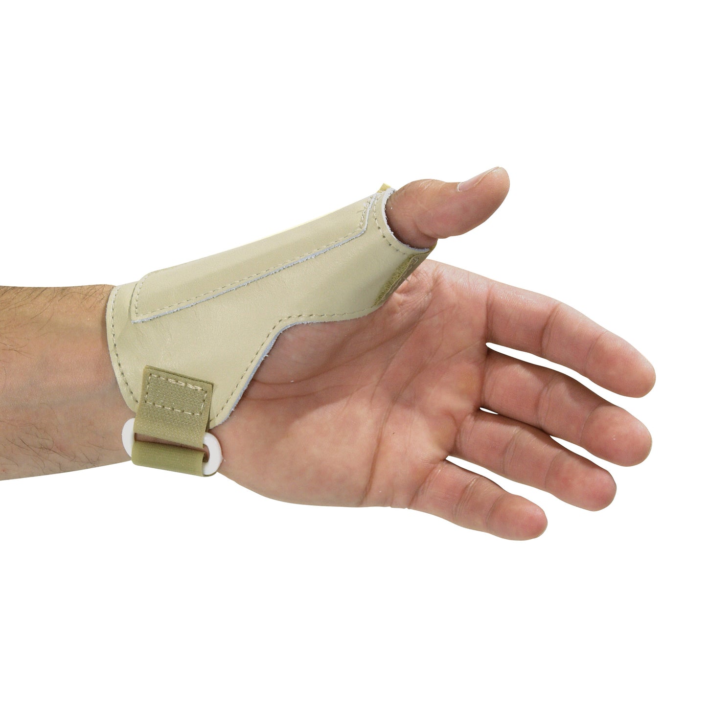 A hand wearing the AliMed Low-Profile Thumb Stabilizer, a beige brace that supports the thumb with a strap around the wrist.