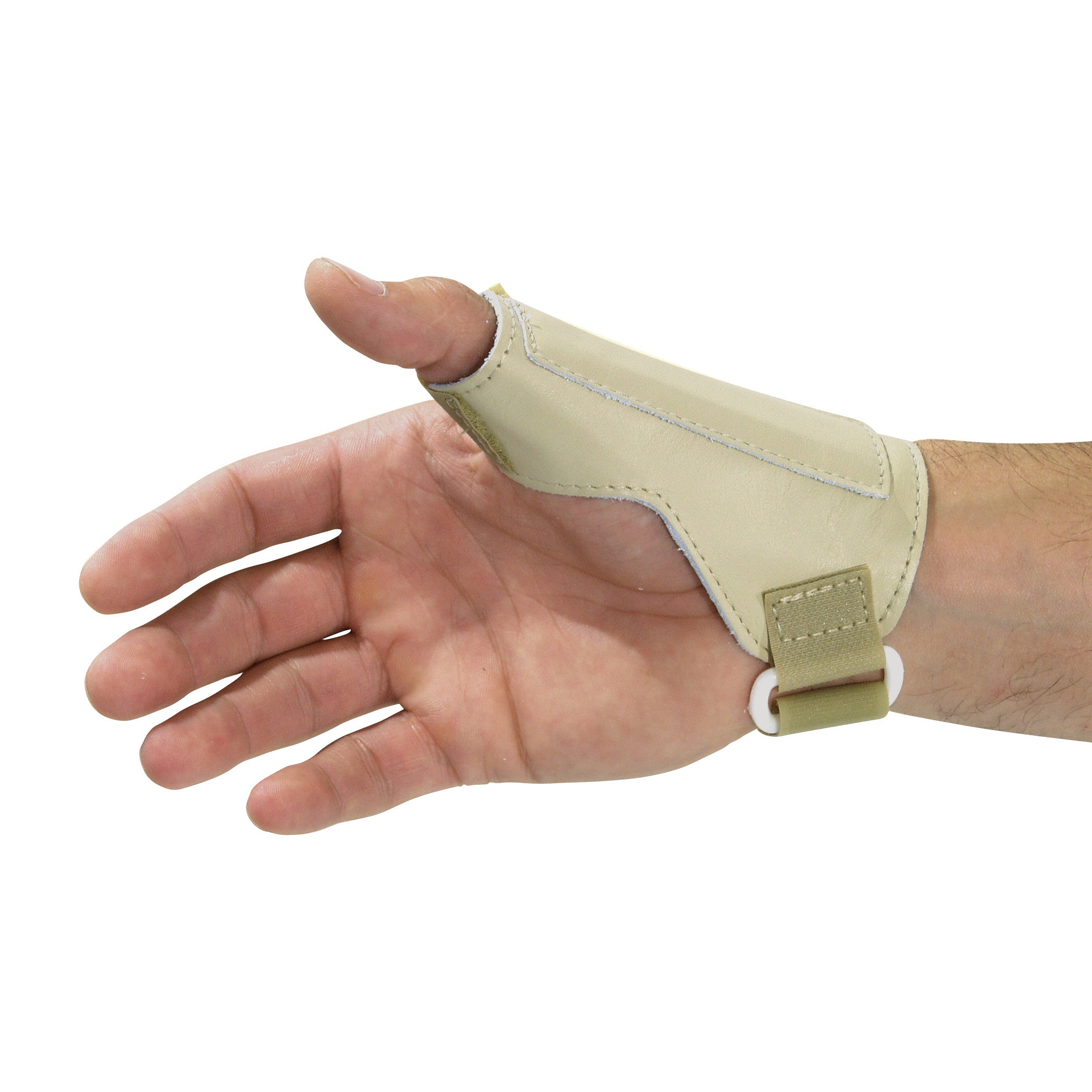 A hand is wearing the AliMed Low-Profile Thumb Stabilizer, a beige brace supporting the thumb with a strap around the wrist.