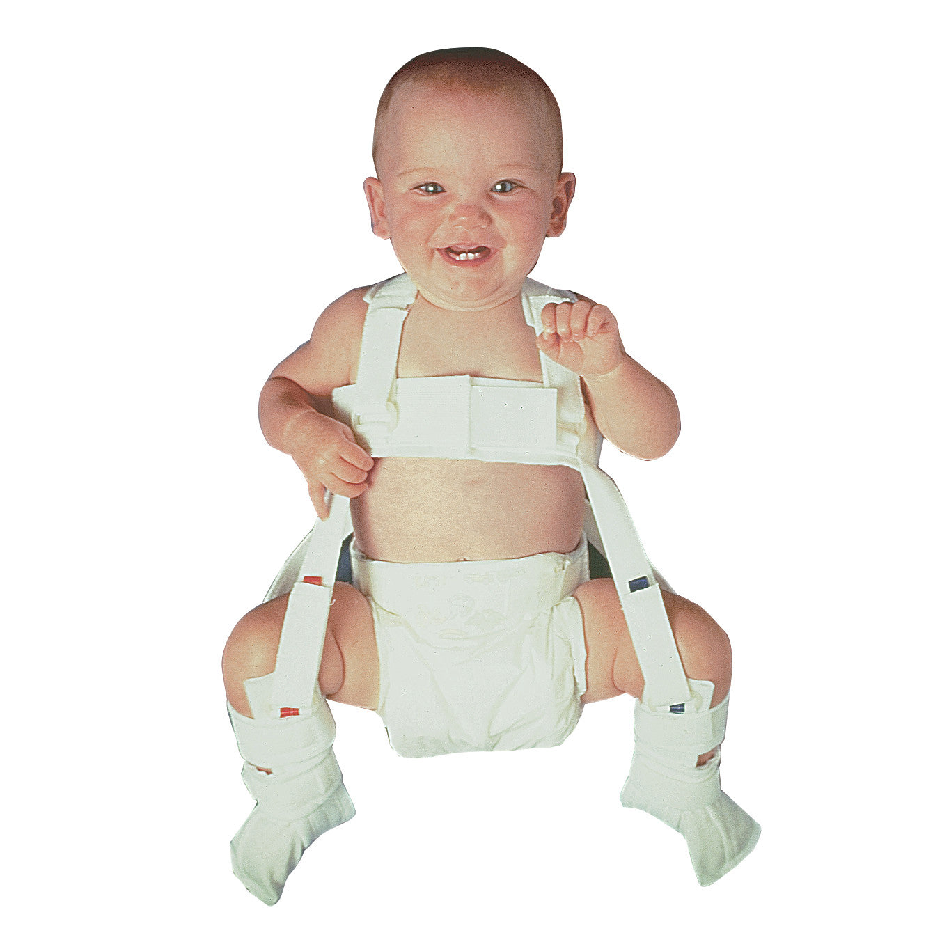 A smiling baby wearing a Wheaton Pavlik Harness, designed for hip stabilization, seated with legs supported by fabric straps.