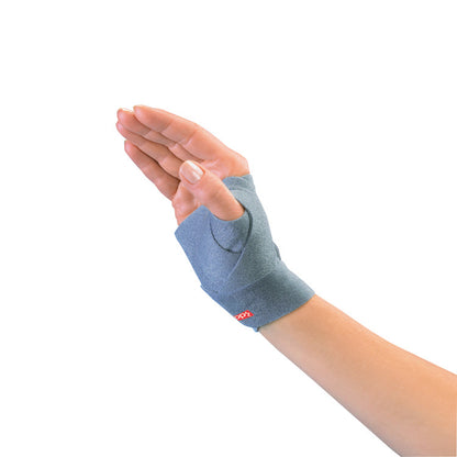 A hand wearing a 3pp ThumSling Thumb Splint, designed for thumb support, in a gray material with visible seams and a logo.