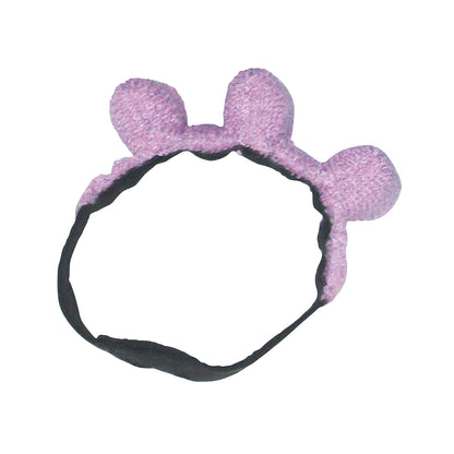 A Comfy Splints Pediatric Finger Separator featuring a black band with three plush, purple cushions for finger separation.