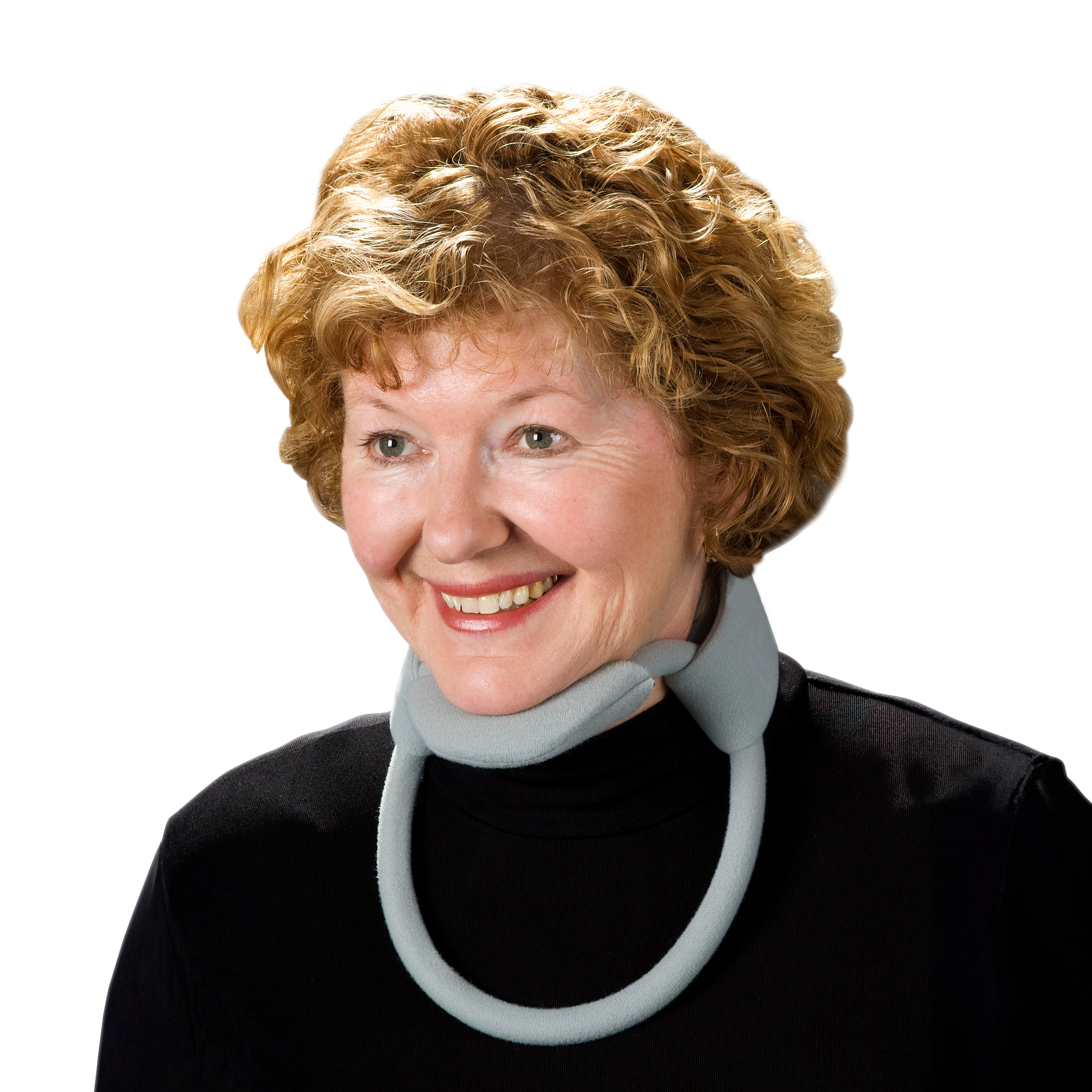 Smiling woman wears a gray Headmaster Collar, a neck support device, over a black shirt against a white background.