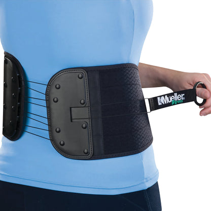 A person wears the Mueller Sports Medicine Green Adjustable Back and Abdominal Support, showing its fit and adjustable straps.