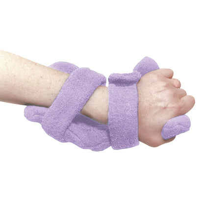 A hand wearing the Comfy Splints Pediatric Deviation Hand/Wrist Orthosis in purple, designed for wrist support and alignment.