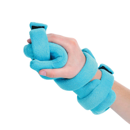 A blue Comfy Splints Pediatric Opposition Hand/Thumb Orthosis is wrapped around a hand, providing support and alignment.
