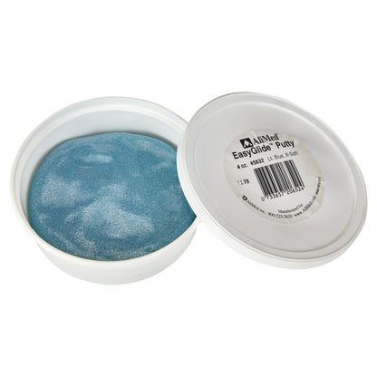 The AliMed EasyGlide Antimicrobial Therapy Putty, light blue and extra soft, is in a white container with the lid partially off.