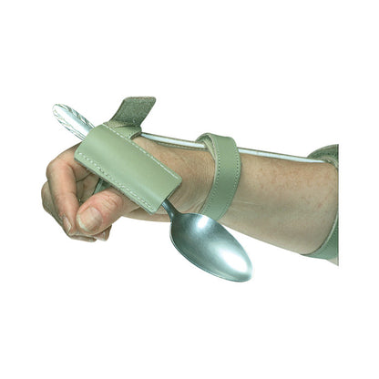 A hand with a "Right Angle Pocket" device securing a spoon, providing support for easier use. The device has green straps.