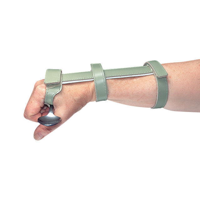 A hand wearing the Economy ADL Wrist Support, a gray strap securing a utensil in the closed grip, providing wrist stability.