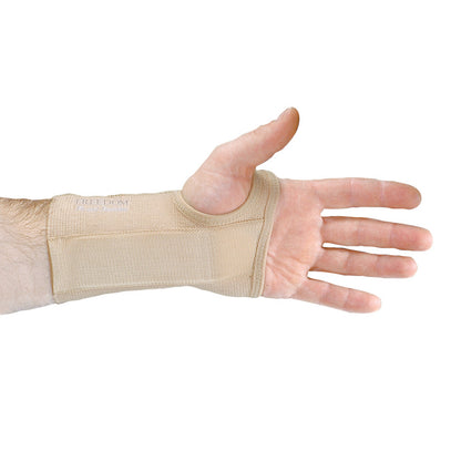 A hand wearing the AliMed FREEDOM Short Elastic Wrist Support, showcasing its beige color and snug fit around the wrist.