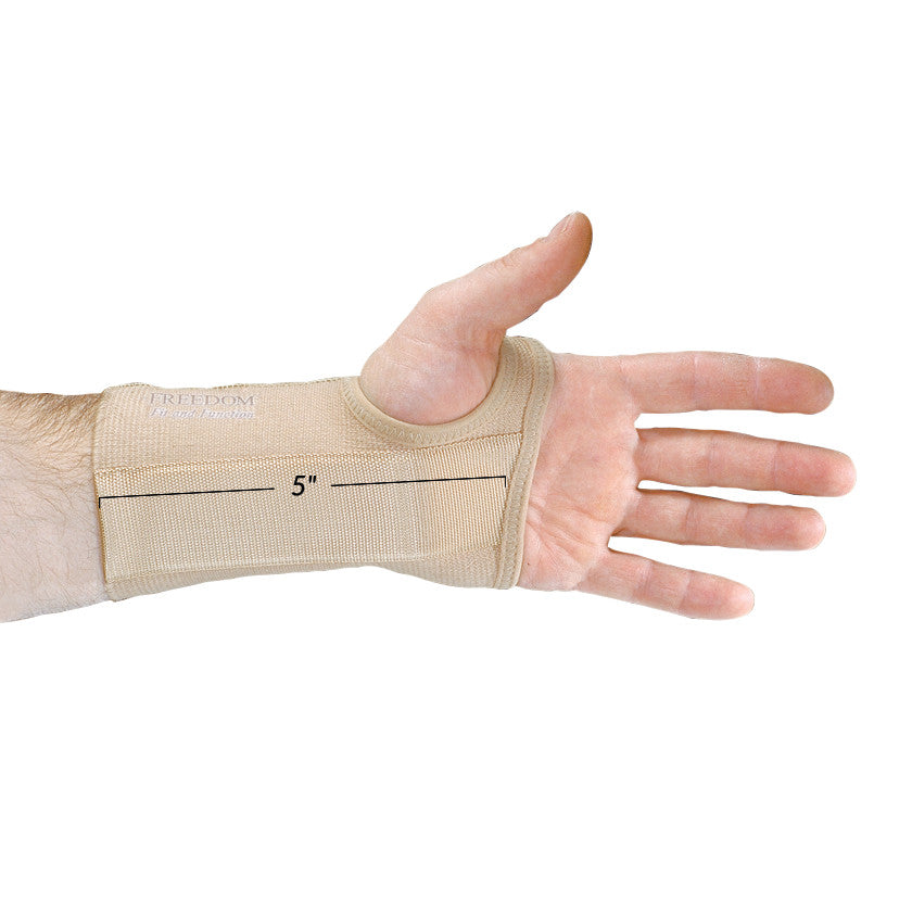 A hand wearing the beige AliMed FREEDOM Short Elastic Wrist Support, measuring 5 inches in length, showing open palm.