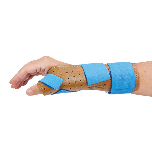 A hand wearing the AliMed FREEDOM Thumb Spica, a brown brace with blue straps, designed to support the thumb and wrist.