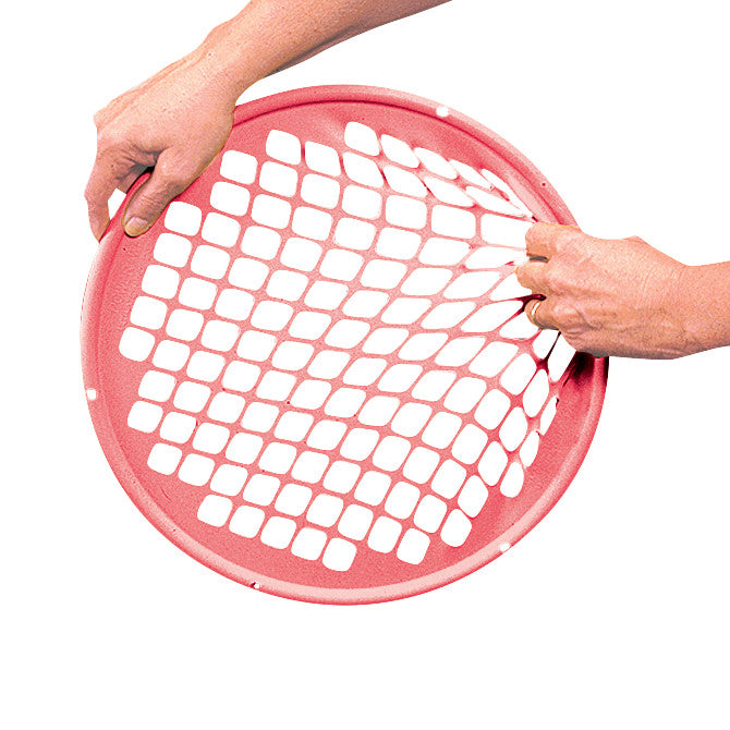 Two hands stretch a red Power-Web Exerciser, featuring a round mesh design, used for hand and wrist strength training.