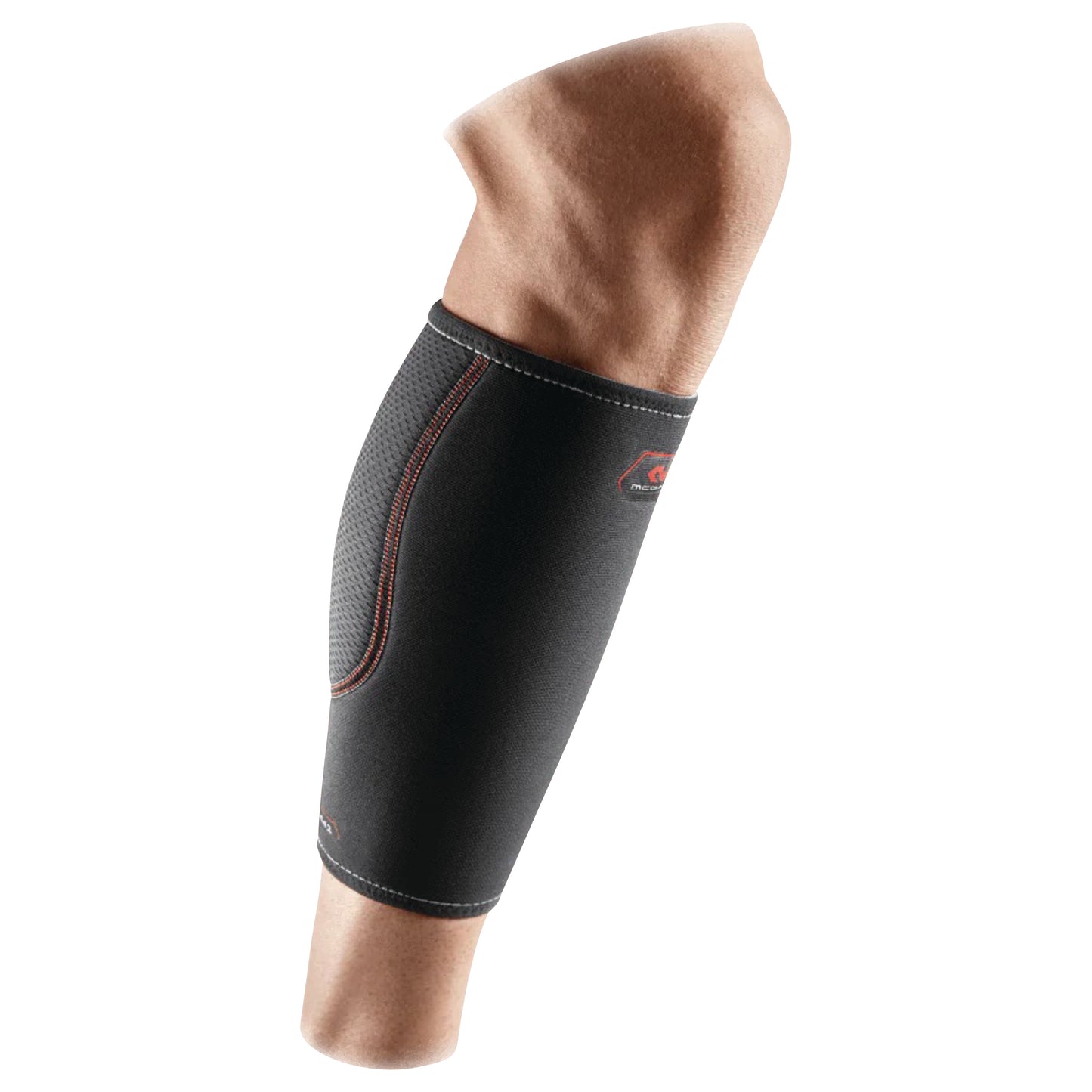 A McDavid Deluxe Calf Support in black and gray is shown on a person's leg, featuring red stitching and branding.