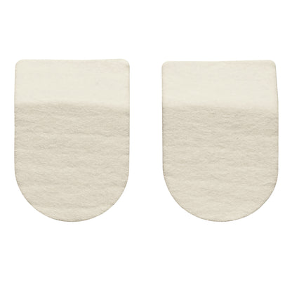 Two Hapad Heel Pads, cream-colored and U-shaped, are displayed side by side on a white background.