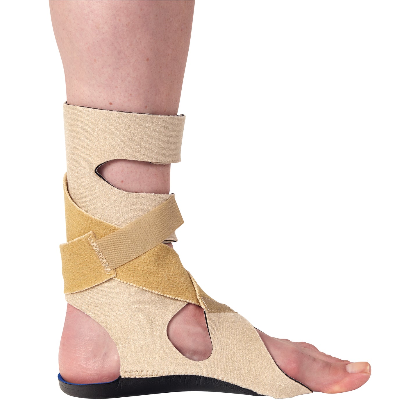 A leg wearing an AliMed FREEDOM Soft Footdrop Brace, featuring beige and tan straps for support with an open-toe design.
