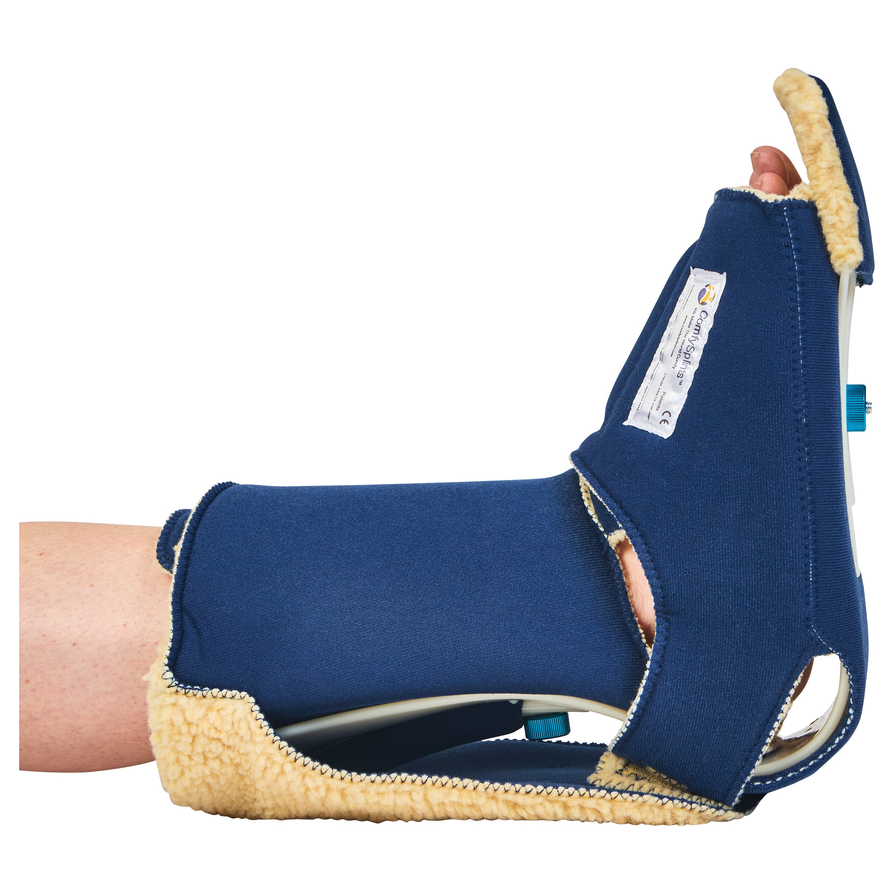 A foot is shown wearing a Comfy Splints Adult Standard Contracture Boot, featuring a blue exterior and soft tan interior lining.