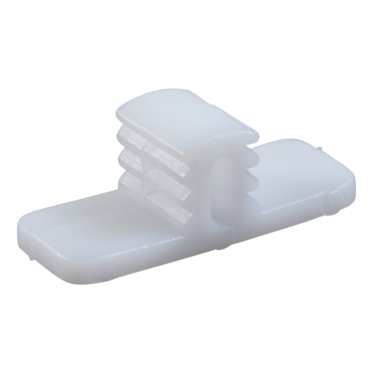 A white plastic Replacement Wedge for CastWedge Starter Set, featuring a flat base and a multi-tiered raised section.