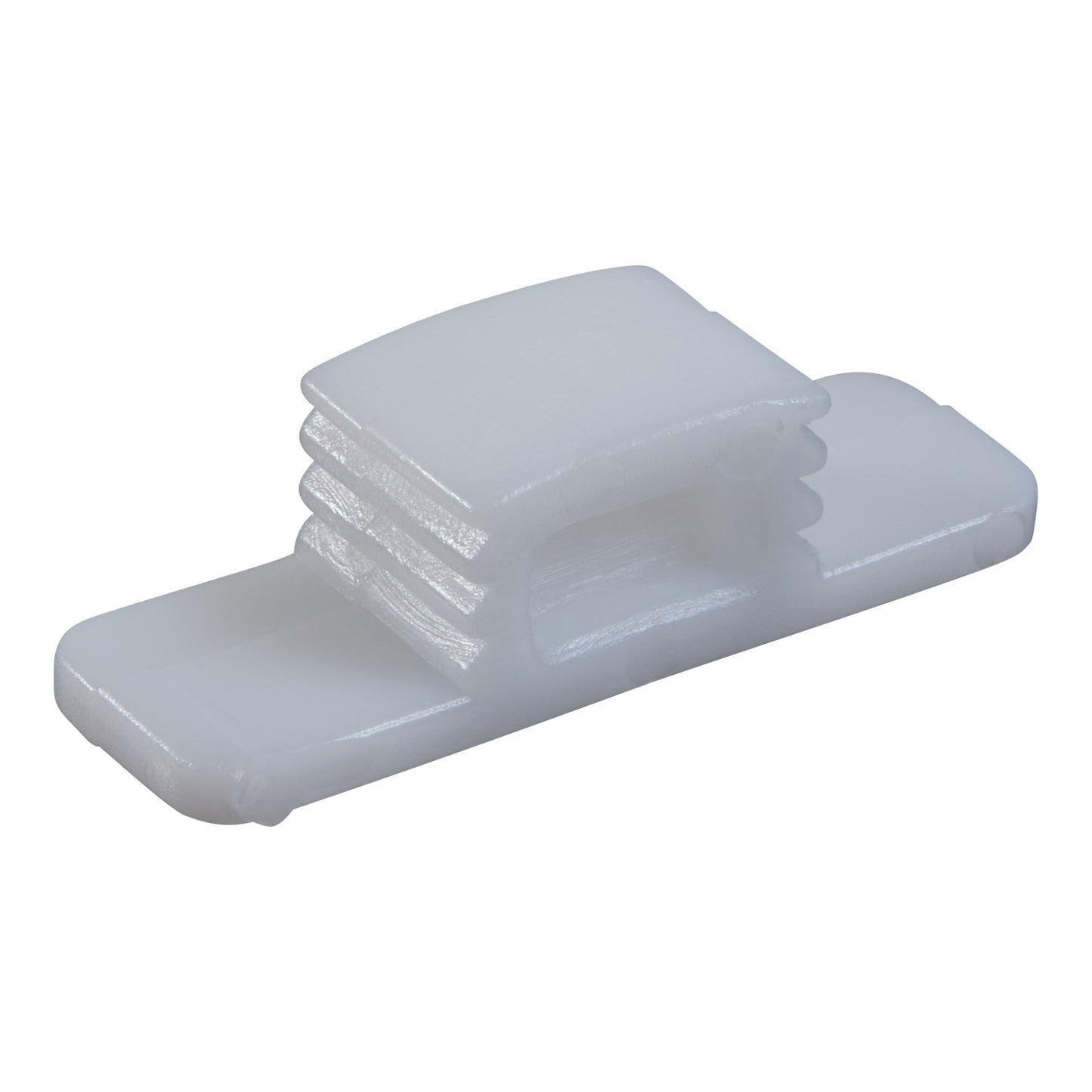 Replacement Wedge for CastWedge Starter Set, a small white plastic piece with a layered design and rectangular shape.