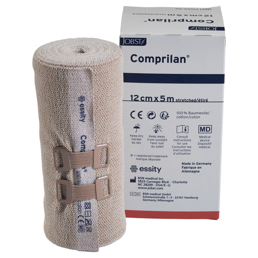 BSN Comprilan Bandage, 12cm x 5m, is shown with its packaging. The bandage is rolled and secured with beige clips.