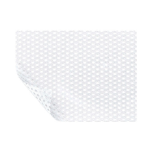 Molnlycke Mepitel Soft Silicone Wound Contact Layer shown with a corner slightly lifted, featuring a grid-like open structure.