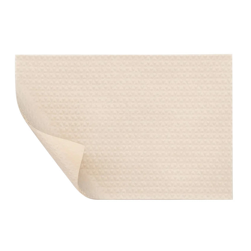 Molnlycke Mepiform Self-Adherent Soft Silicone Dressing, beige, with a slightly textured surface and a corner peeling back.
