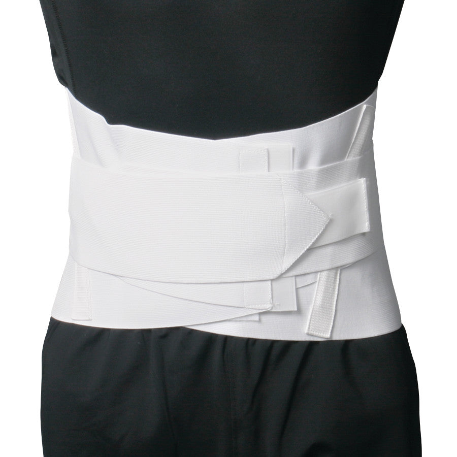 Person wearing the AliMed Lumbosacral Support Plus, a white back brace with multiple overlapping straps, over a black outfit.