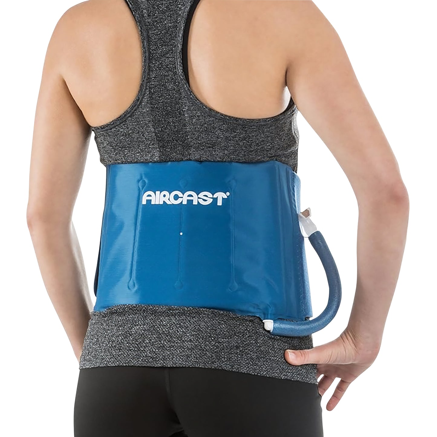 A person wears an Aircast Cryo/Cuff IC System on their lower back. The blue device has a connector tube attached.