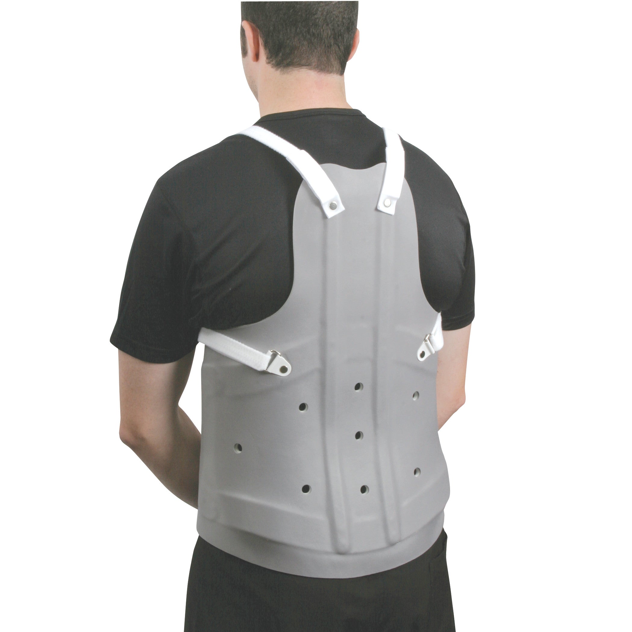 A person wears an AliMed TLSO back brace, featuring a hard gray shell with ventilation holes and adjustable white straps.