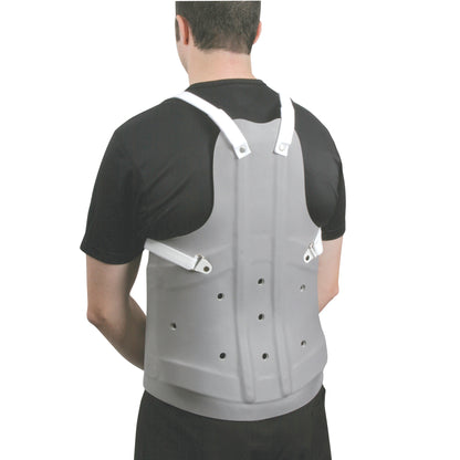 A person wears an AliMed TLSO back brace, featuring a hard gray shell with ventilation holes and adjustable white straps.