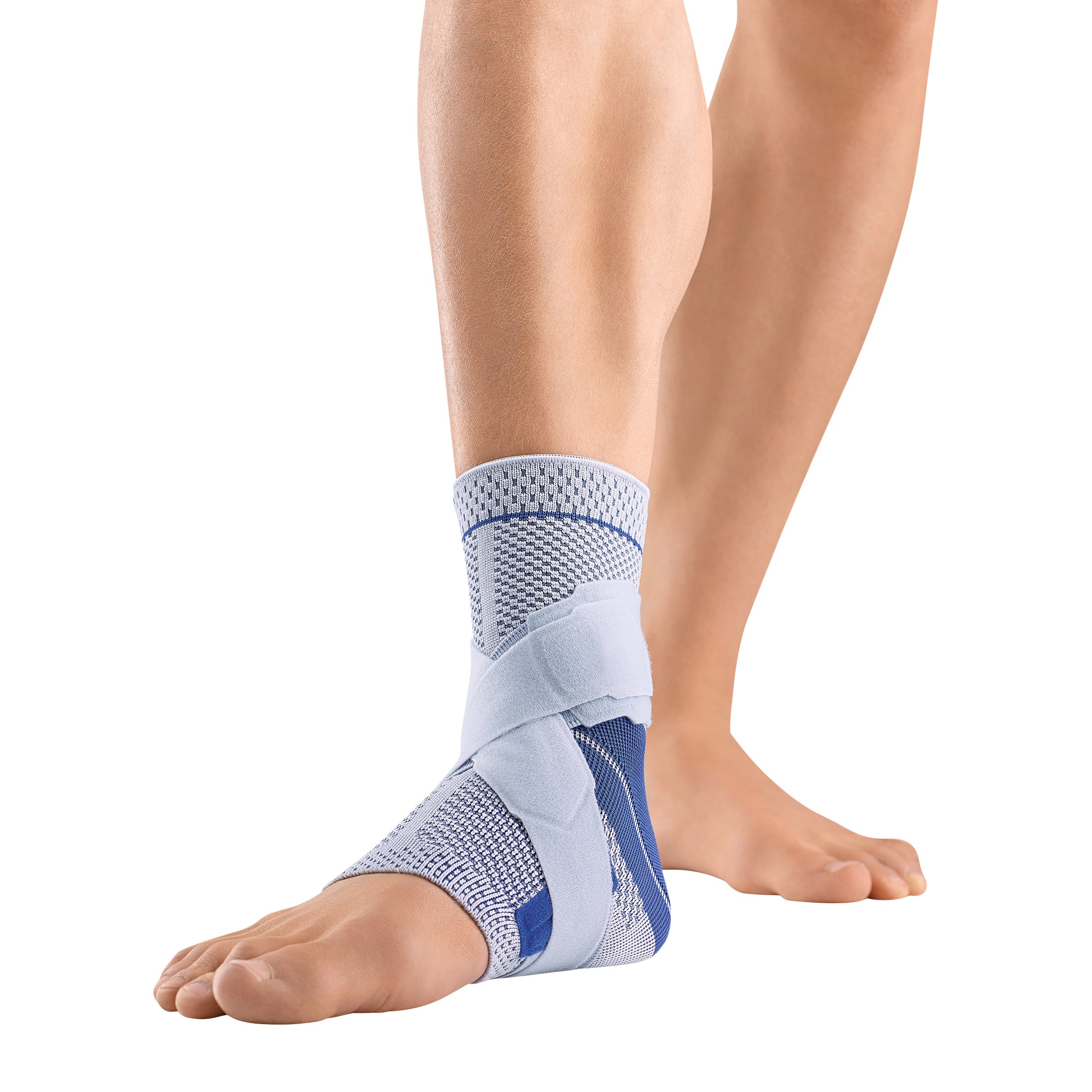 A person wears the Bauerfeind MalleoTrain S Ankle Support, featuring blue and gray fabric with a strap-wrap design on the ankle.