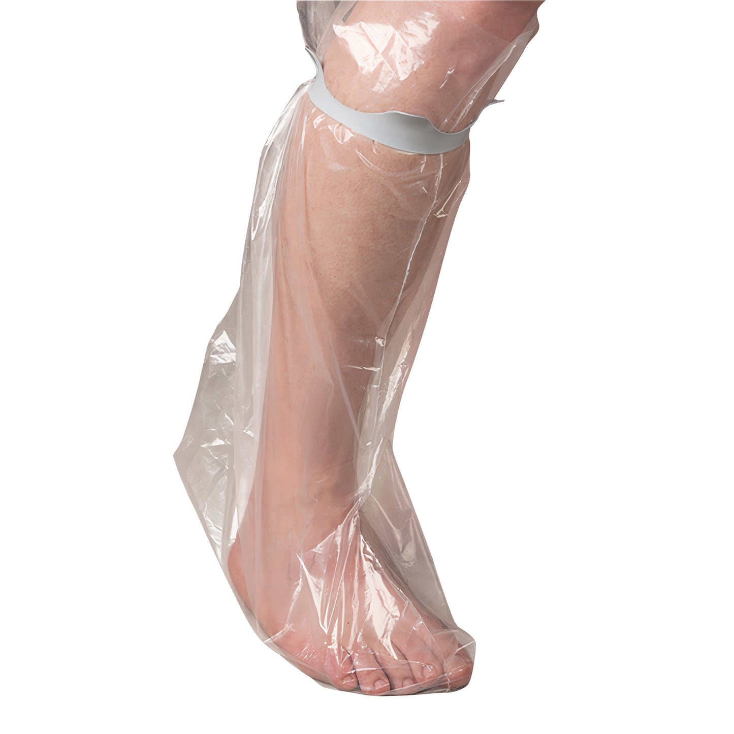 A leg wearing a Brownmed SEAL-TIGHT Seal Band, a transparent waterproof cover, secured just below the knee.