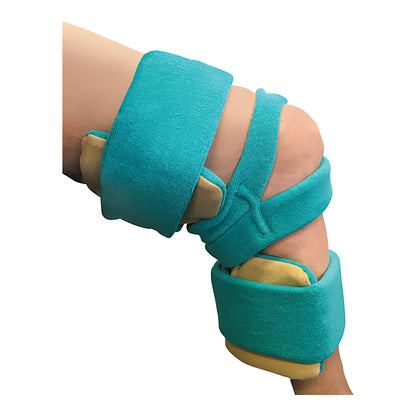 A knee wearing the AliMed ULTRApadded Knee Orthosis, featuring turquoise padding with beige accents, providing joint support.