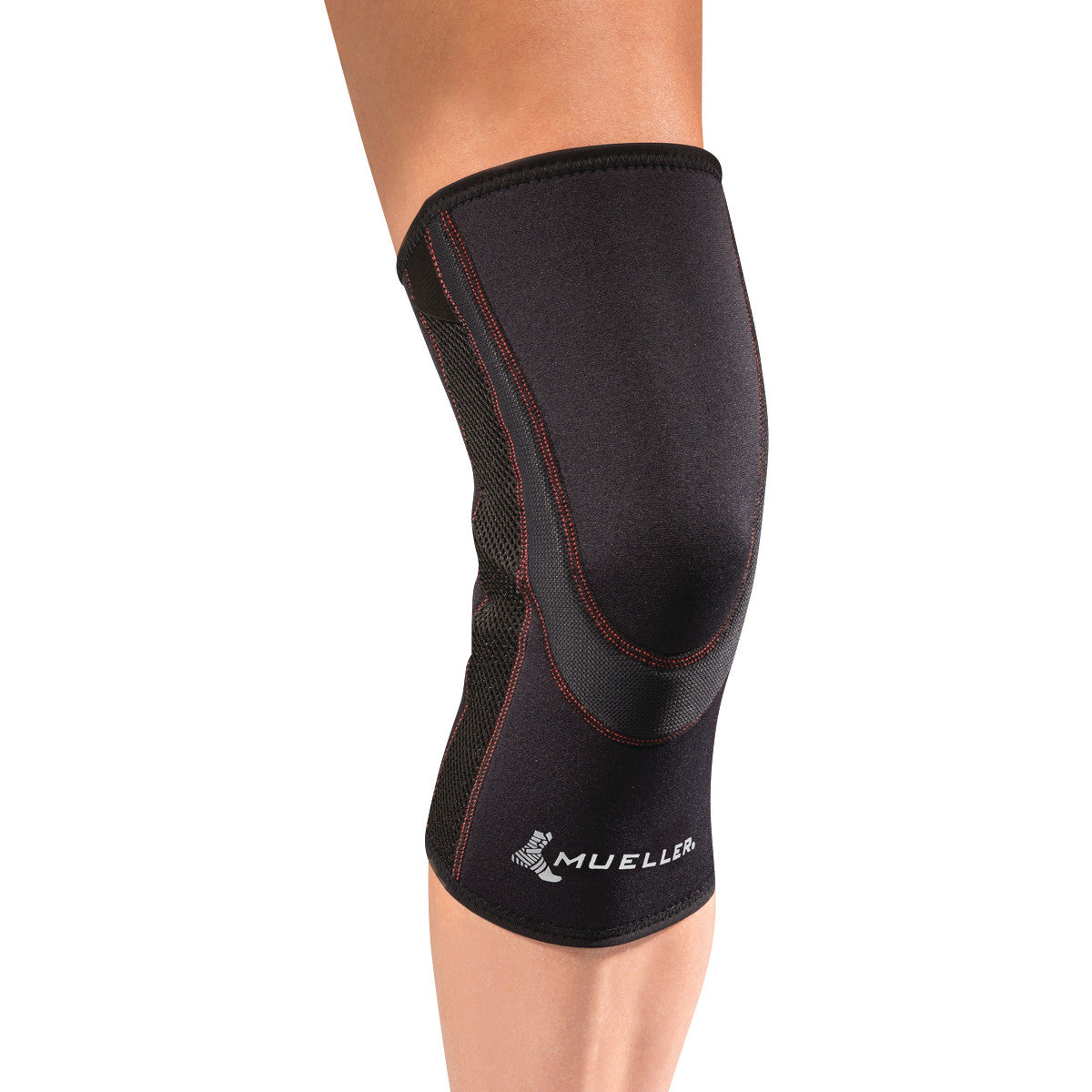 A person wears the Mueller Breathable Closed Patella Knee Sleeve. It is black with red stitching and a white logo.