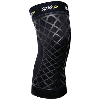 The Brownmed Spark Kinetic Knee Sleeve is black with a gray crisscross pattern and has "Spark" printed on the top band.